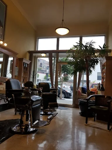 Exterior of Ingleside Barber Shop at 393 Ashton Avenue in San Francisco